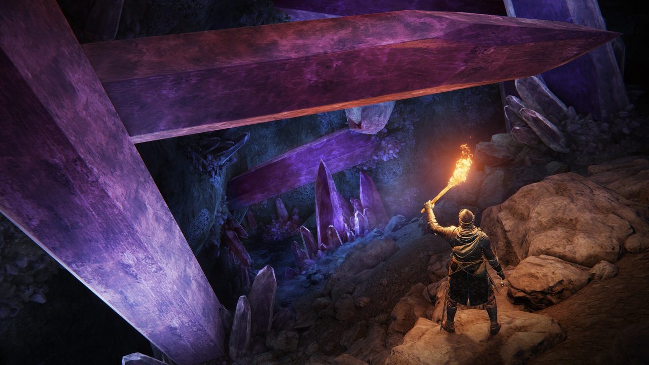 Elden Ring screenshot of a torch-lit crystal cave